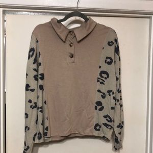 NWT. Hopely brand. Long sleeved top Size S but Oversized. Tan and animal print
